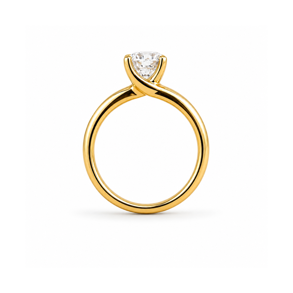 Side profile of the Amelie solitaire, showing the tapered yellow gold band and 4 claw setting