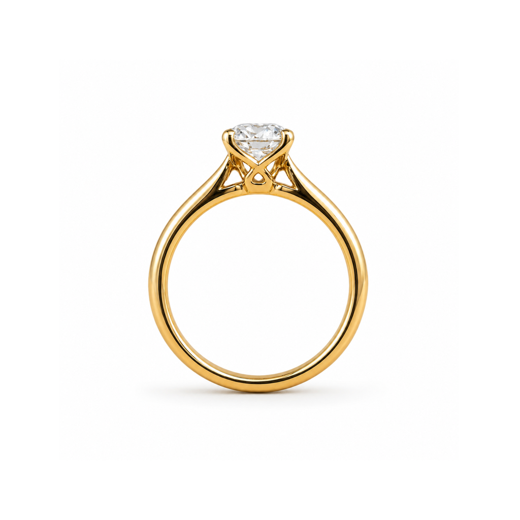 Clarisse solitaire engagement ring side profile, showing the open yellow gold gallery