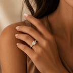 Odette princess cut ring worn on a model's hand against a tan top