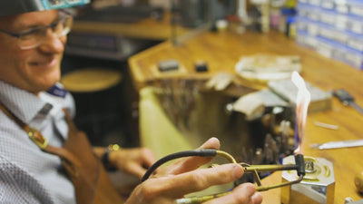 Maurice Lorenz Goldsmith & Diamond Setter at the jeweller's bench creating a piece.